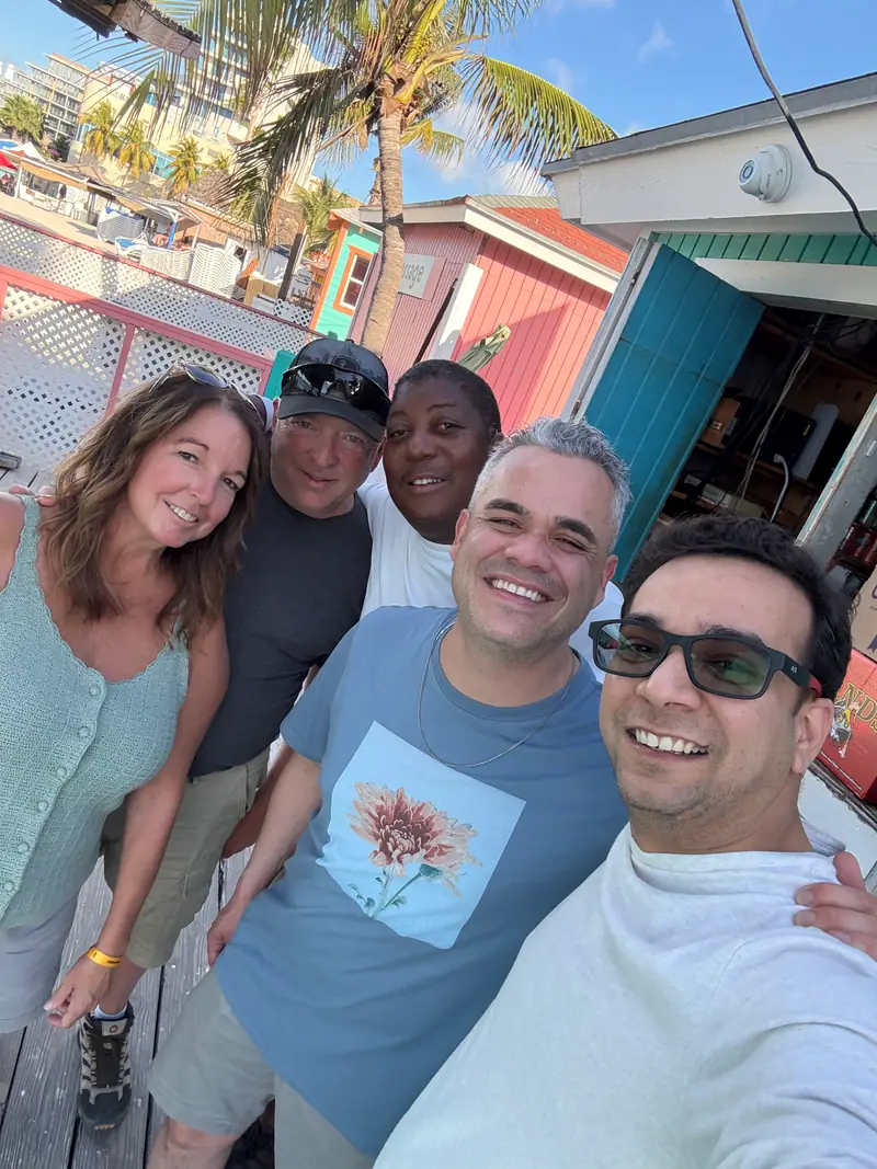 Nabil Valiulla with friends on a dock
