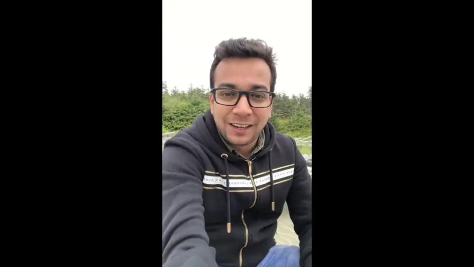 Nabil Valiulla talking to the camera outdoors